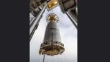 A 77-ft long payload fairing holding the first 27 satellites for Amazon's Kuiper broadband constellation was hoisted atop a United Launch Alliance Atlas V rocket on March 31 in preparation for launch no earlier than April 9. Credit: United Launch Alliance